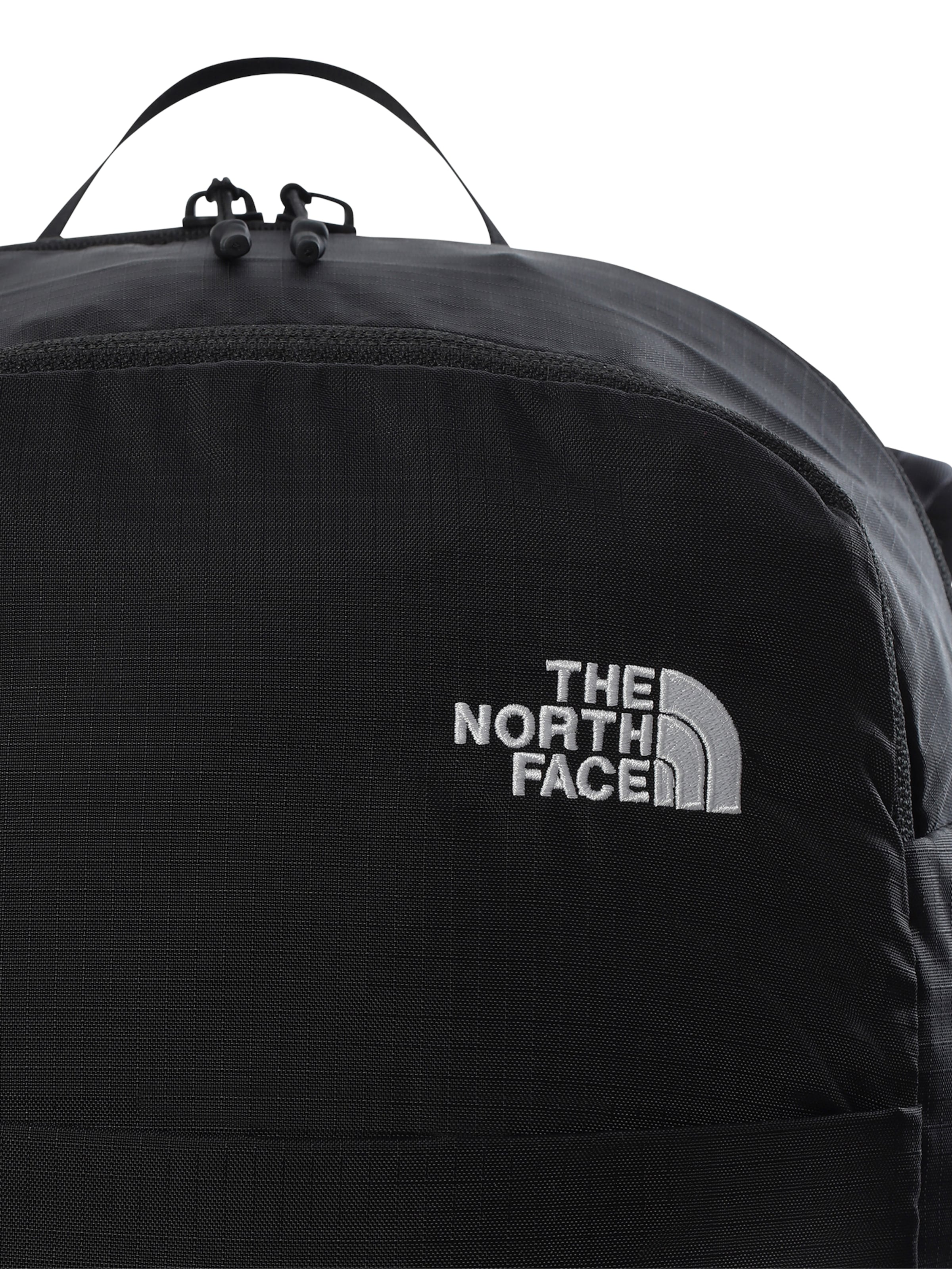 THE NORTH FACE Spordiseljakott 'BASIN 18' must / valge