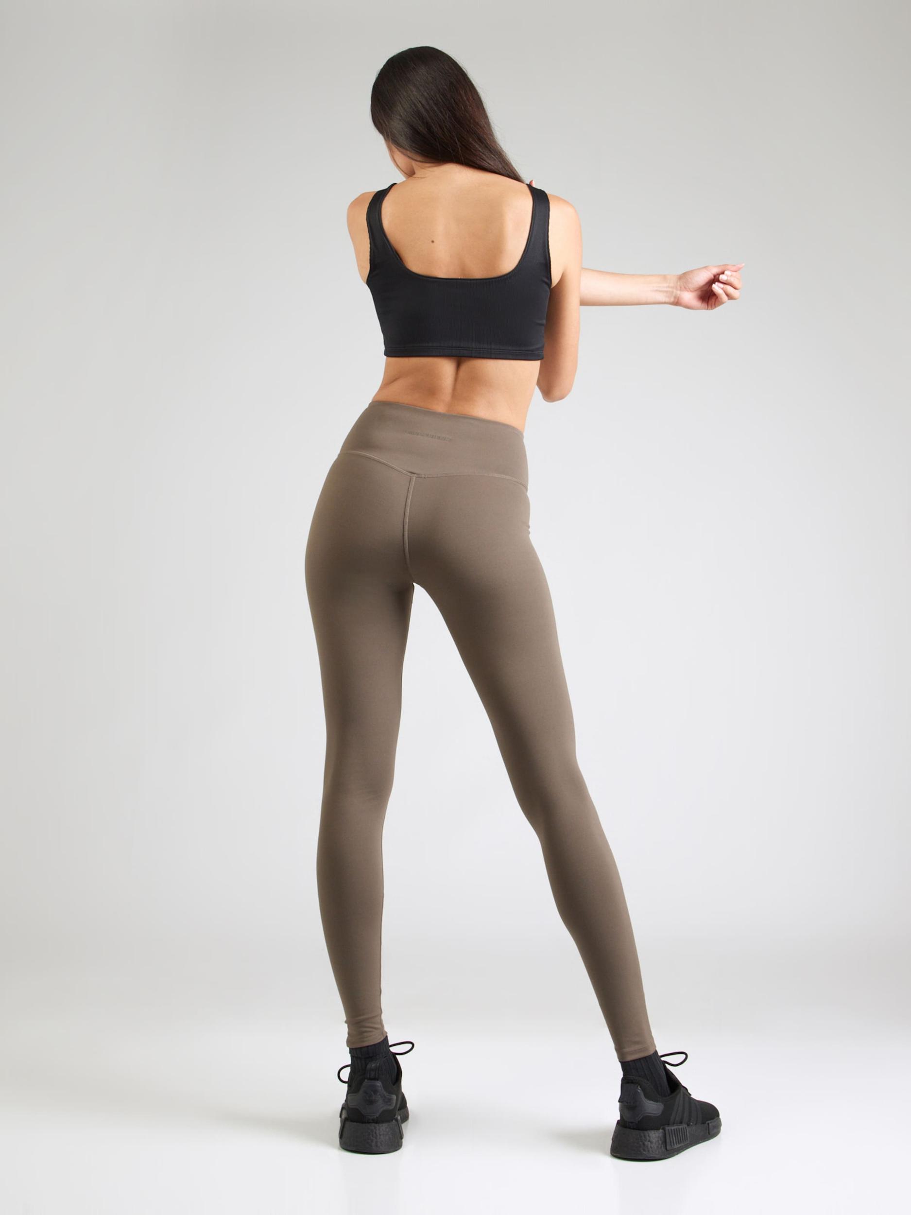 Girlfriend Collective Spordipüksid 'FLOAT' tumebeež