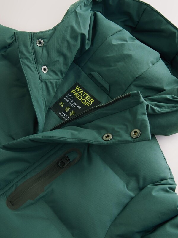 Next Mantel smaragdroheline